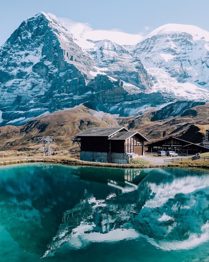 Breathtaking view of the Swiss Alps reflecting in a tranquil lake near Sachseln.